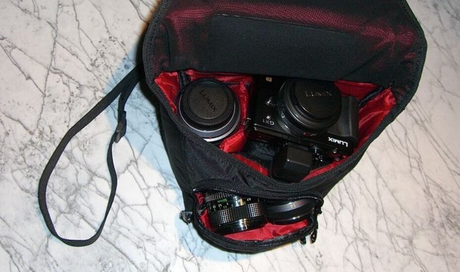 a camera bag with camera and lenses
